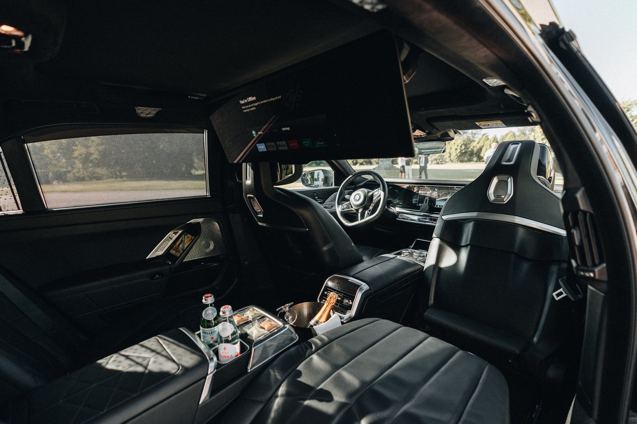 The 31-inch theatre screen folded down in the BMW i7
