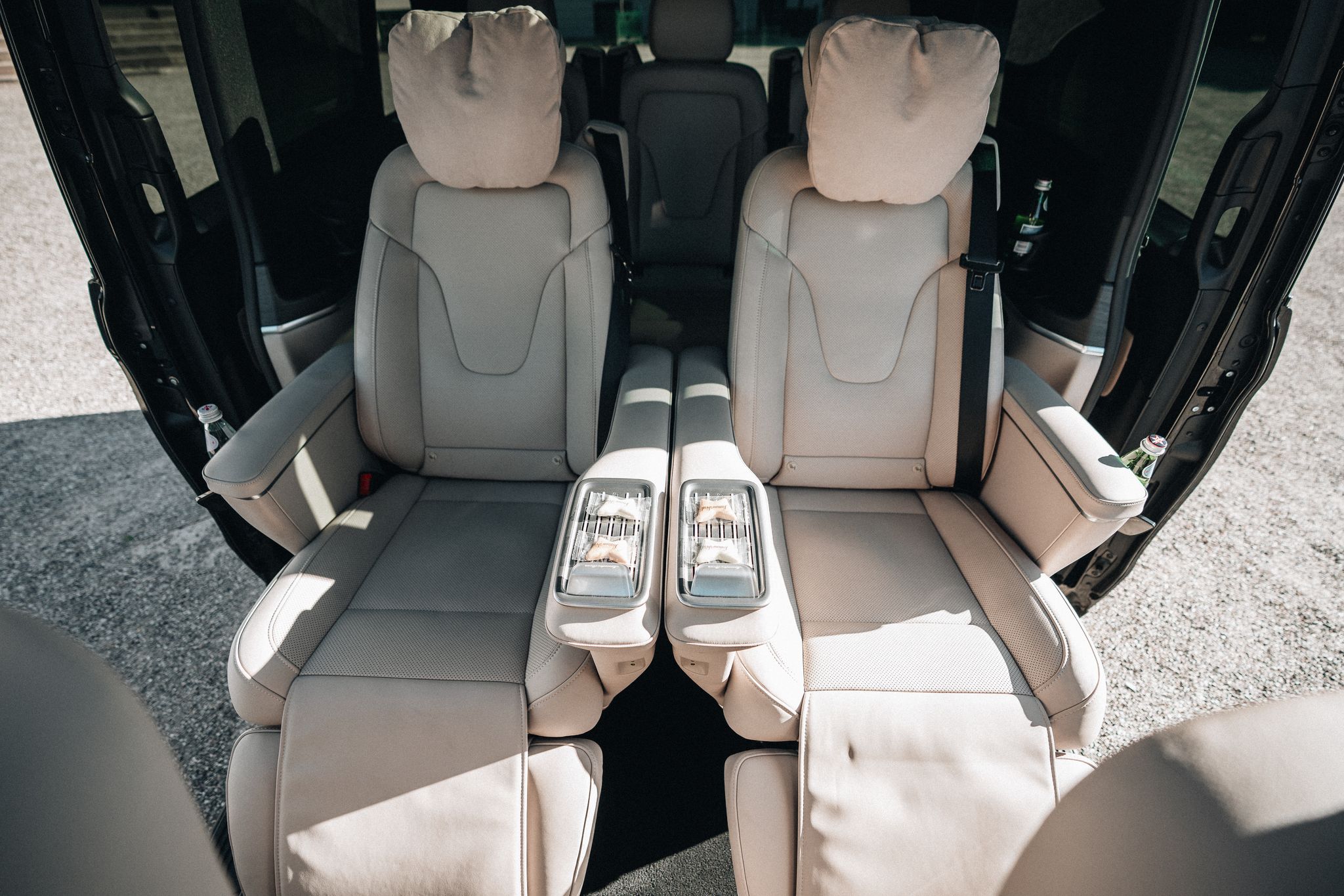 Mercedes-Benz EQV VIP, the LuxLimo Executive Lounge, in front of a Danish manor house