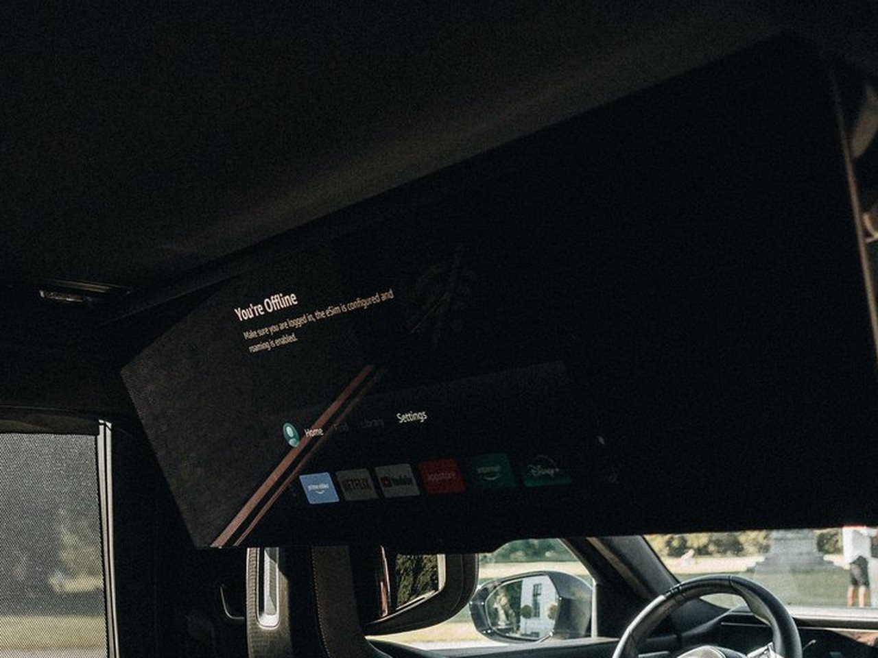 The BMW i7 theatre screen folded down from the roof