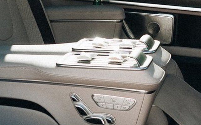 The trays on the armrest between the lounge seats